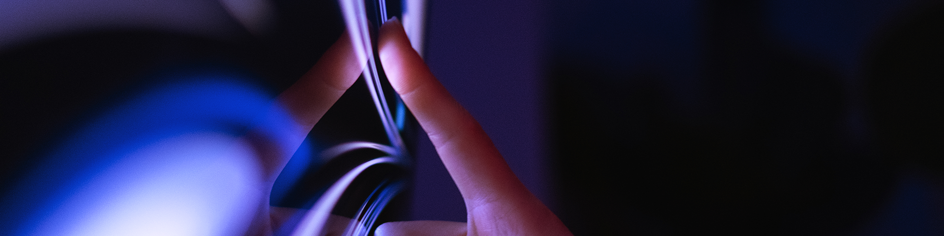 A close-up of the interaction between a person using a touch screen display.