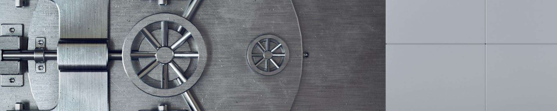 A robust metal safe equipped with a keyhole, illustrating a secure method for safeguarding valuables.